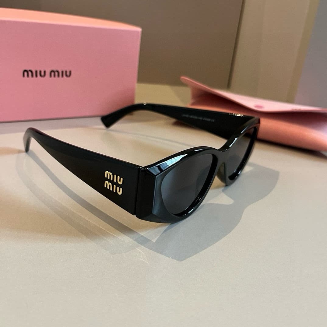 MiuMiu Glasses